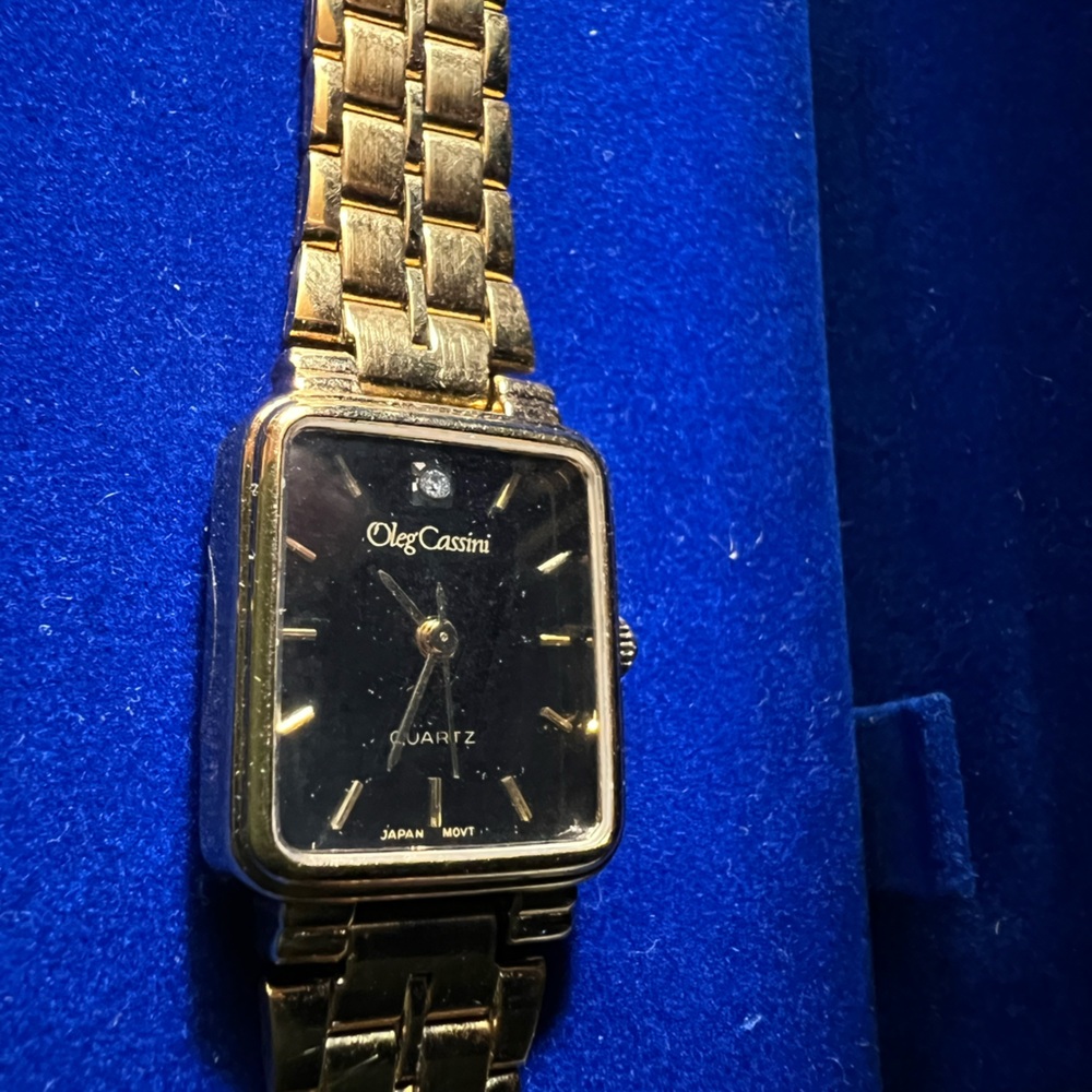Vintage Oleg Cassini quartz diamond ladies wristwatch.
